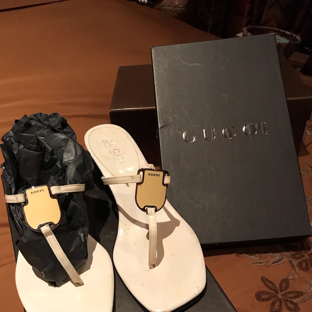 Gucci White Leather Thong Sandals with Gold Shield Accent